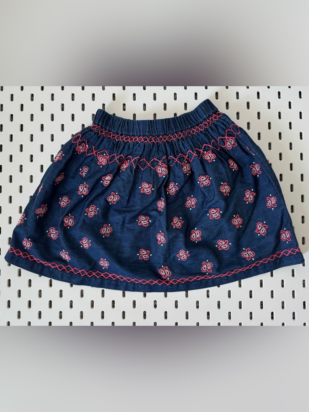 Peek Navy Mini Skirt with Pink Embroidered Motifs